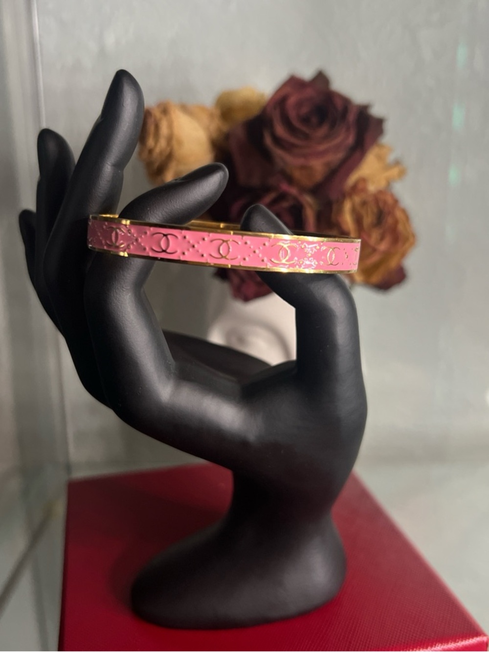 Pink & gold tone bangle